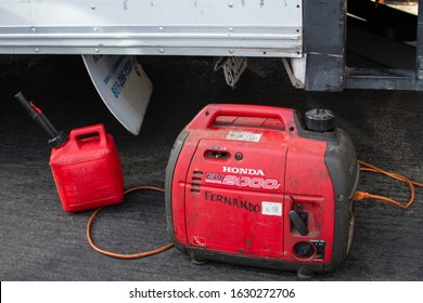 Canoga Park, California / USA -  January 25, 2020: A Honda EU 2000i Inverter Generator And Gas Can Sit By A Truck At The Canoga Park Farmer's Market On Owensmouth Ave.