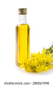 Canola Oil & Rapeseed Flowers Isolated On A White Background