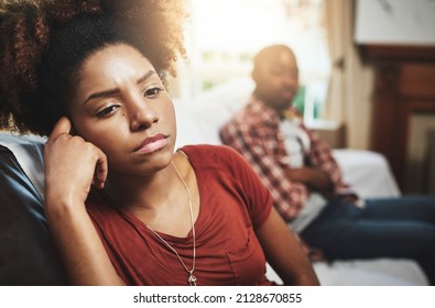 I cant believe were fighting about this again.... Cropped shot of a young woman giving her boyfriend the silent treatment after a fight. - Shutterstock ID 2128670855