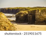 Cantabric sea coast view in northern Spain. Ocean at low tide. Playa las Catedrales, Catedrais beach in Ribadeo, province of Lugo, Galicia.