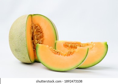 Cantaloupe Melon Slices Isolated On White