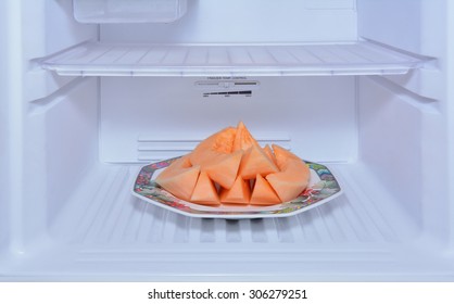 Cantaloupe In Refrigerator.