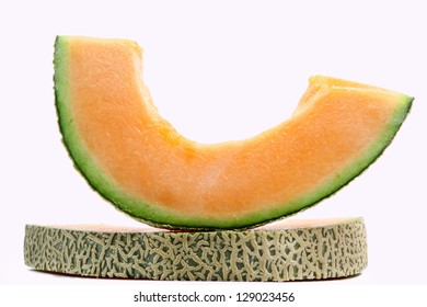 Cantaloupe Slice Isolated On White With Clipping Path