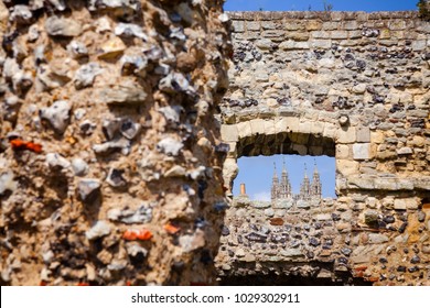Canterbury Cathedral  seen through window of ruined St Augustine's Abbey wall, the oldest Benedictine monastery in Canterbury, Kent Southern England, UK. UNESCO World Heritage Site