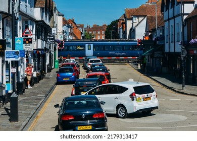 Canterbury, UK - July 16, 2022: High Speed Train Passing A Rail Crossing On Wincheap In Canterbury, Kent, UK