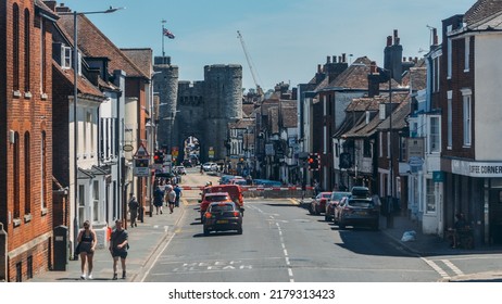 Canterbury, UK - July 16, 2022: High Speed Train Passing A Rail Crossing On Wincheap In Canterbury, Kent, UK. Westgate Is Visible In Far Background