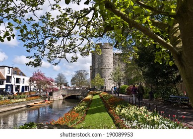 CANTERBURY,UK-APRIL 17: The  Westgate Towers and gardens. The towers are the largest surviving medieval gate in England. Canterbury has over six million visitors a year.April 17 2014, Canterbury UK