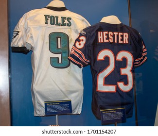 Canton, Oh / USA - April 17, 2019: Pro football memorabilia on display at the Pro Football Hall of Fame. Foles number nine and Hester number 23 jerseys.