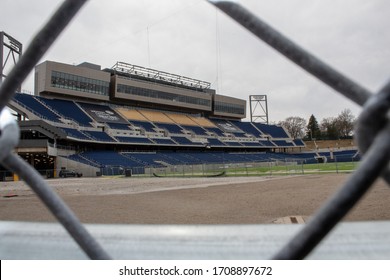 Canton, Oh / USA - April 17, 2019: View Of The Tom Benson Hall Of Fame Stadium Framed With Fence And Selective Focus.