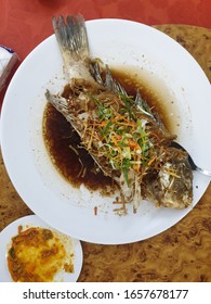 Cantonese Styled Steamed Whole Fish In Chinese Restaurant 