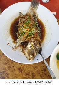 Cantonese Styled Steamed Whole Fish In Chinese Restaurant 