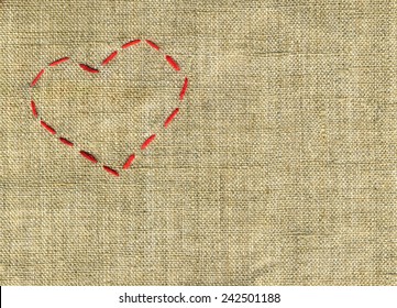 Canvas Background With An Embroidered Red Heart