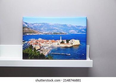 Canvas Print Landscape Photo And White Shelf Hanging On Grey Wall Background, Interior Decoration