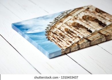 Canvas print. Photo with gallery wrap method of canvas stretching on stretcher bar. Photography with image of the ancient Roman amphitheatre in Nimes city, France