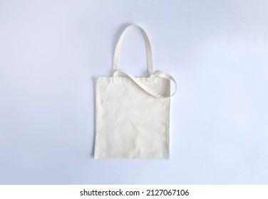 Canvas Tote Bag. Mockup.Reusable Grocery Shopping Bag With Copy Space.Beige Eco Bag Mockup.Eco Friendly Concept. Zero Waste.Think Green.Top View.