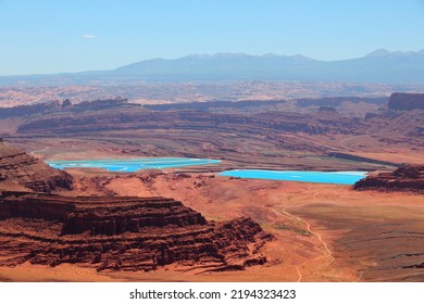 Canyon Landscape - Dead Horse Point State Park In Utah, United States. Potassium Mining Colorful Ponds.