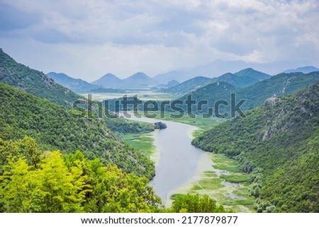 Canyon of Rijeka Crnojevica river near the Skadar lake coast. One of the most famous views of Montenegro. River makes a turn between the mountains and flows backward