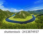 Canyon of Rijeka Crnojevica river in Skadar Lake National Park. One of the most famous views of Montenegro. The Green Pyramid and the bend of the river between mountains.