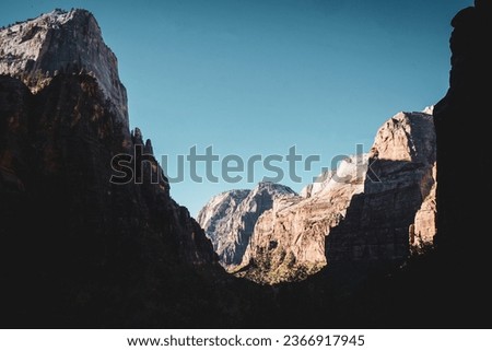 Canyon view during day time, shadow effect, giant rocky mountains, Zion national park, rocky mountain view