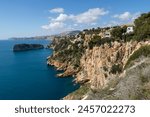 Cap de la Nau, beautiful views of the cliffs and the blue sea of Alicante, on the Gulf of Valencia, Mediterranean Sea, Spain 