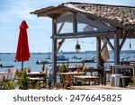 Cap Ferret (Arcachon Bay, France). Terrace of an oyster tasting hut in the oyster district of Les Jacquets
