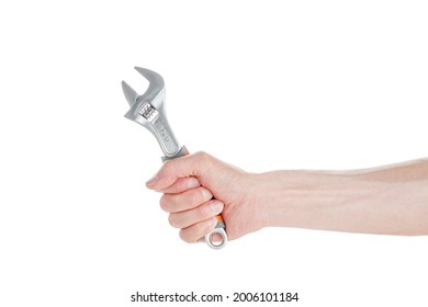 A cap wrench, a split wrench in the hand of a worker, a builder, isolated on a white background