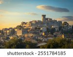 Capalbio medieval village skyline at sunset. Maremma, province of Grosseto, Tuscany region, Italy