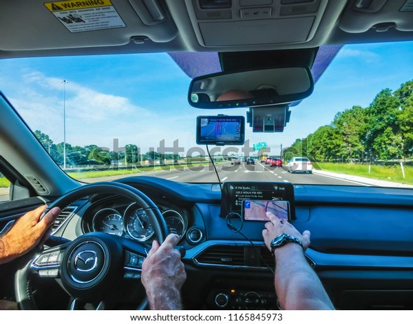 Cape Canaveral,\
USA - April 29, 2018: The Navigation system in the car at Cape\
Canaveral, USA on April 29,\
2018