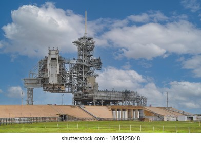 Cape Caneveral, FL, USA-June 2015; View of the empty NASA launch platform of the space shuttle at Kennedy Space Center against a white clouded blue sky