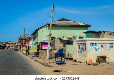 Cape Coast, Ghana - April 14, 2022: Cityscape Of Local African Cape Coast Town With Ghana People And Cars On The Street