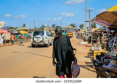 Cape Coast, Ghana - April 14, 2022: Cityscape Of Local African Cape Coast Town With Ghana People And Cars On The Street