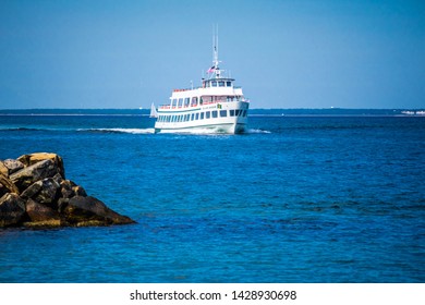 Cape Cod Marthas Vineyard, MA, USA - Sept 4, 2018: The Island Queen Bay Ferry Cruising Along The Shore Of Cape Cod