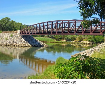 Cape Cod Rail Trail Bicycle Bridge Over The Bass River. The Estuary Separates The Towns Of Yarmouth And Dennis In Cape Cod,Massachusetts.