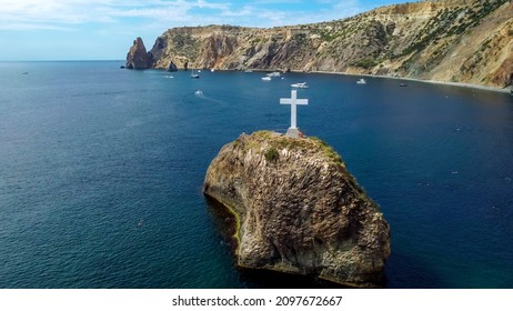 Cape Fiolent Sevastopol. Crimea. September 15, 2021. Beautiful view of St. George's rock with a cross on Cape Fiolent on the Crimean peninsula.