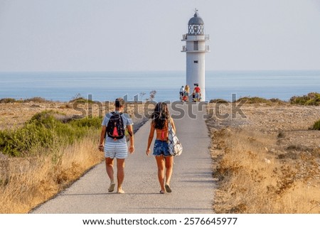 Similar – Foto Bild Balearen Formentera Cap de Barberia und Mittelmeer mit kleinen Menschen