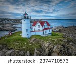 The Cape Neddick Light is a lighthouse in Cape Neddick, York, Maine.  In 1874 Congress appropriated $15,000 to build a light station at the "Nubble Island" and in 1879 construction began. 