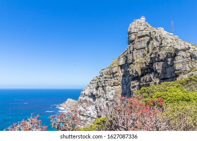 Cape Point with the old lighthouse built in 1850 high up on the cliff overlooking the Atlantic ocean near Cape Town South Africa - Shutterstock ID 1627087336