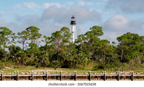 Cape San Blas lighthouse with beautiful blue sky and pine forest - Shutterstock ID 2067025658
