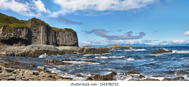 Cape Stolbchaty is the main natural attraction of the Kuril Islands. Spectacular columnar basalt formations of Cape Stolbchaty, a UNESCO World Heritage Site, are 50 million years old - Shutterstock ID 1563780712