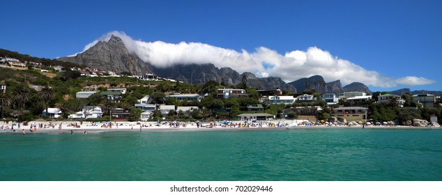 Cape Town And Coast Line, Jetty. Far Mountain On The Blue Sky Background.Sandy Beach And Ocean. South Africa