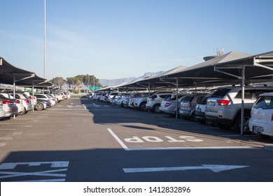 Cape Town International Airport - May 29, 2019: Rows And Rows Of Parked Cars Or Vehicles In Parking Bays At The Shade Undercover Car Park In The Vicinity Of The Terminal Buildings