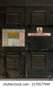 Cape Town - May 04, 2020:  Electricity Or Electrical Sub Station Closeup With Signage Or A Sign With Emergency First Aid Instructions And Contact Details