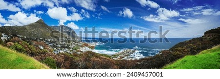Cape Town panoramic landscape, Camp's Bay and Lion's Head mountain, coastal city between mountains, South Africa..