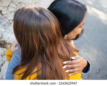 Cape Town, South Africa 02-06-2022

Close Up Of Two Beautiful, Female, South African Friends Having A Warm Moment Together. Smiling And Hugging One Another.