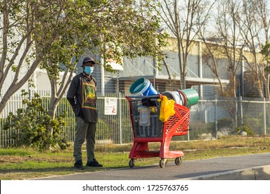 Cape Town, South Africa - 06 May 2020: Homeless Man Collecting Garbage During Covid 19 Corona Virus Pandemic.