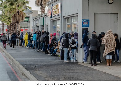 Cape Town, South Africa - August 2020: Covid Relief Funds In South Africa. Long Lines For People Waiting For  Money To Feed Themselves. Poverty In Africa. People Waiting Hours For 20 Dollars.