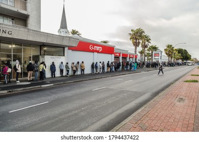 Cape Town, South Africa - August 2020: Covid Relief Funds In South Africa. Long Lines For People Waiting For  Money To Feed Themselves. Poverty In Africa. People Waiting Hours For 20 Dollars.