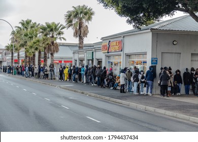 Cape Town, South Africa - August 2020: Covid Relief Funds In South Africa. Long Lines For People Waiting For  Money To Feed Themselves. Poverty In Africa. People Waiting Hours For 20 Dollars.