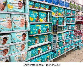 Cape Town, South Africa - Dec 10, 2019: Nappies (or Diapers) On Retail Display. Concept For New Parents, Expenses, Cost Of Living, Baby Item Prices Or Saving Money. Nappies Must Be In The Baby Budget.
