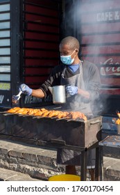 Cape Town, South Africa - June 2020: African Street Food Vendor Wearing Protective Mask, Barbecue Grilled Chicken, Covid 19, Corona Virus, Reopen.